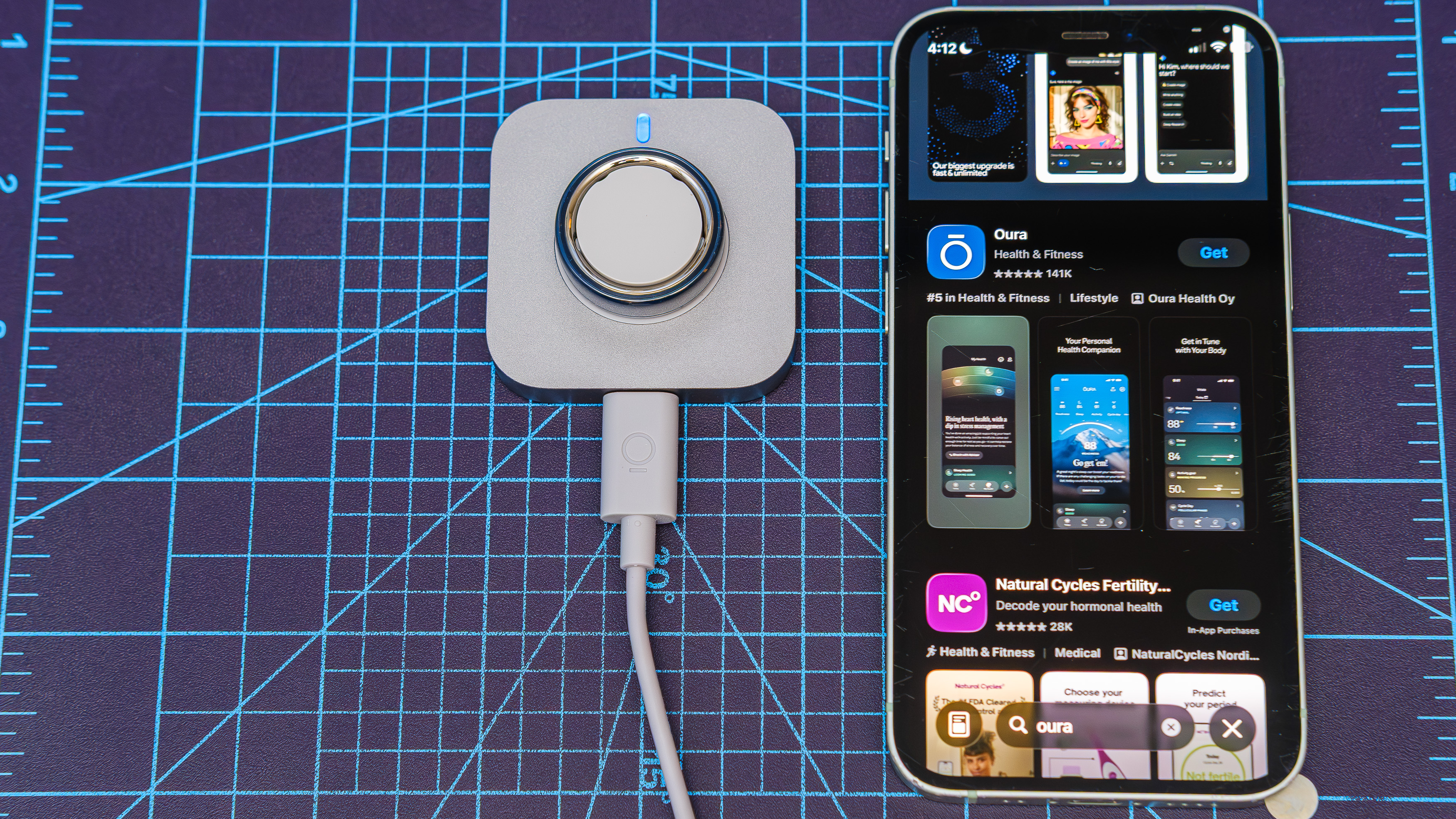Oura Ring 4 Ceramic close-up showing the setup and pairing process using an iPhone