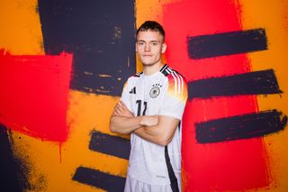 Germany Euro 2024 squad Florian Wirtz of Germany poses for a portrait during the Germany Portrait session ahead of the UEFA EURO 2024 Germany on June 10, 2024 in Herzogenaurach, Germany. (Photo by Boris Streubel - UEFA/UEFA via Getty Images)