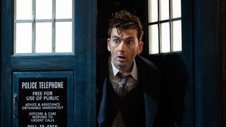 David Tennant poking his head out of the TARDIS door