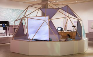 The show is partly made up of a series of Geodesic domes, the lattice-shelled architectural structures