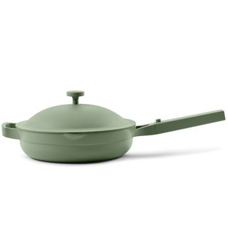 Green frying pan with a green handle