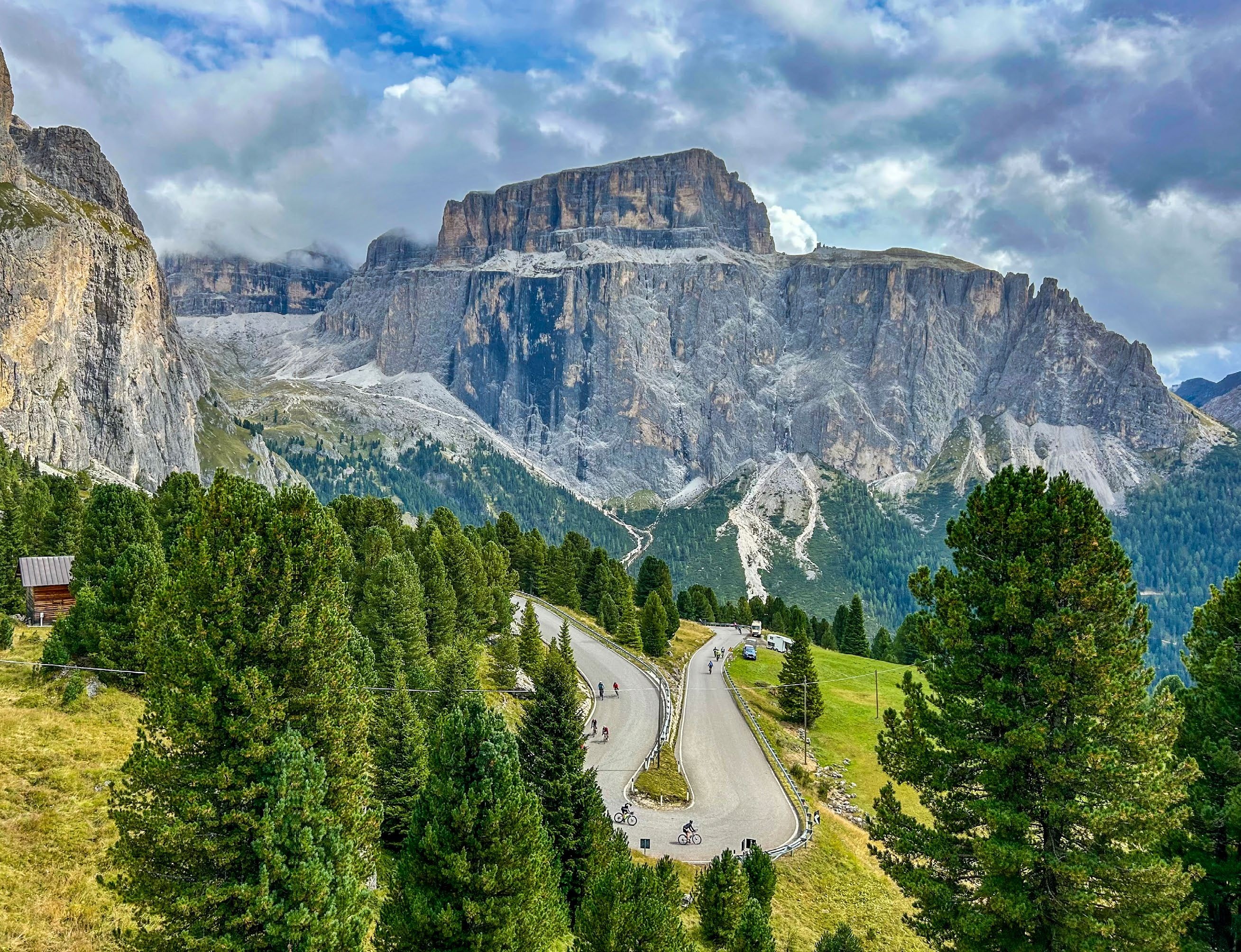 Looking down from a height onto a Dolomites hairpin