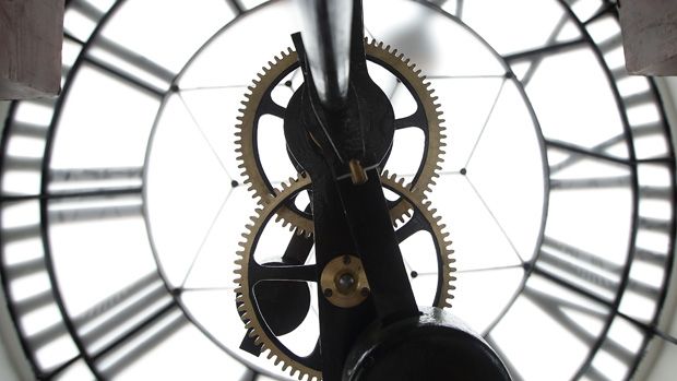 SINGAPORE - JULY 17:Details of the clock mechanism is seen inside the clock tower during the media preview of the Victoria Theatre and Concert Hall on July 17, 2014 in Singapore. The Victoria