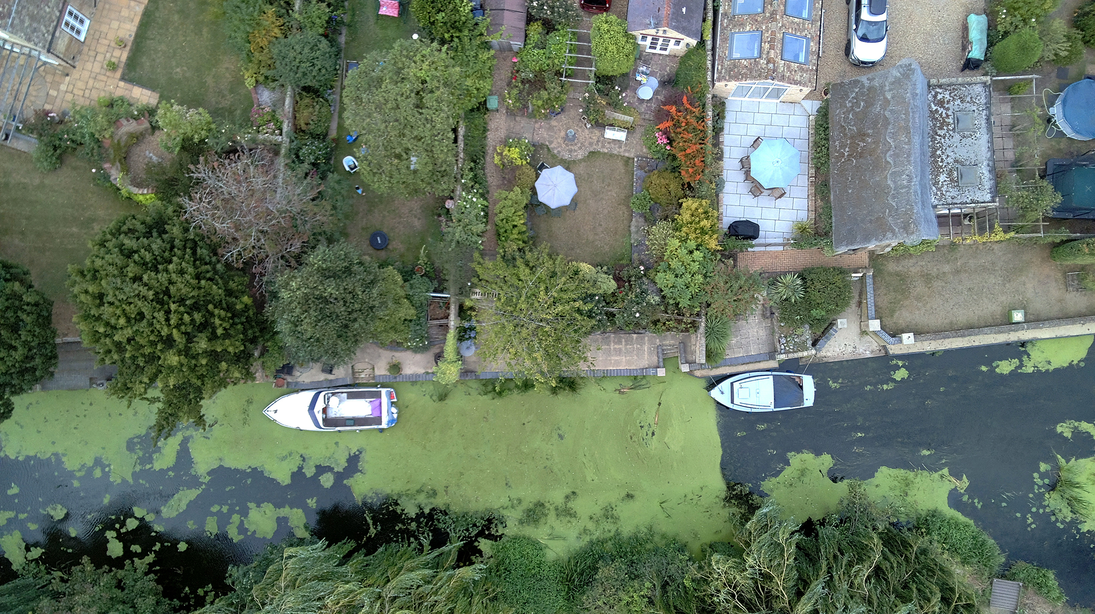 Photo of a river with boats taken with a Bwine F7GIM drone