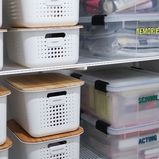 Stackable organization boxes in apartment
