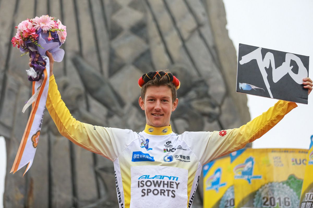Robbie Hucker in the final leader's jersey at the Tour de Taiwan