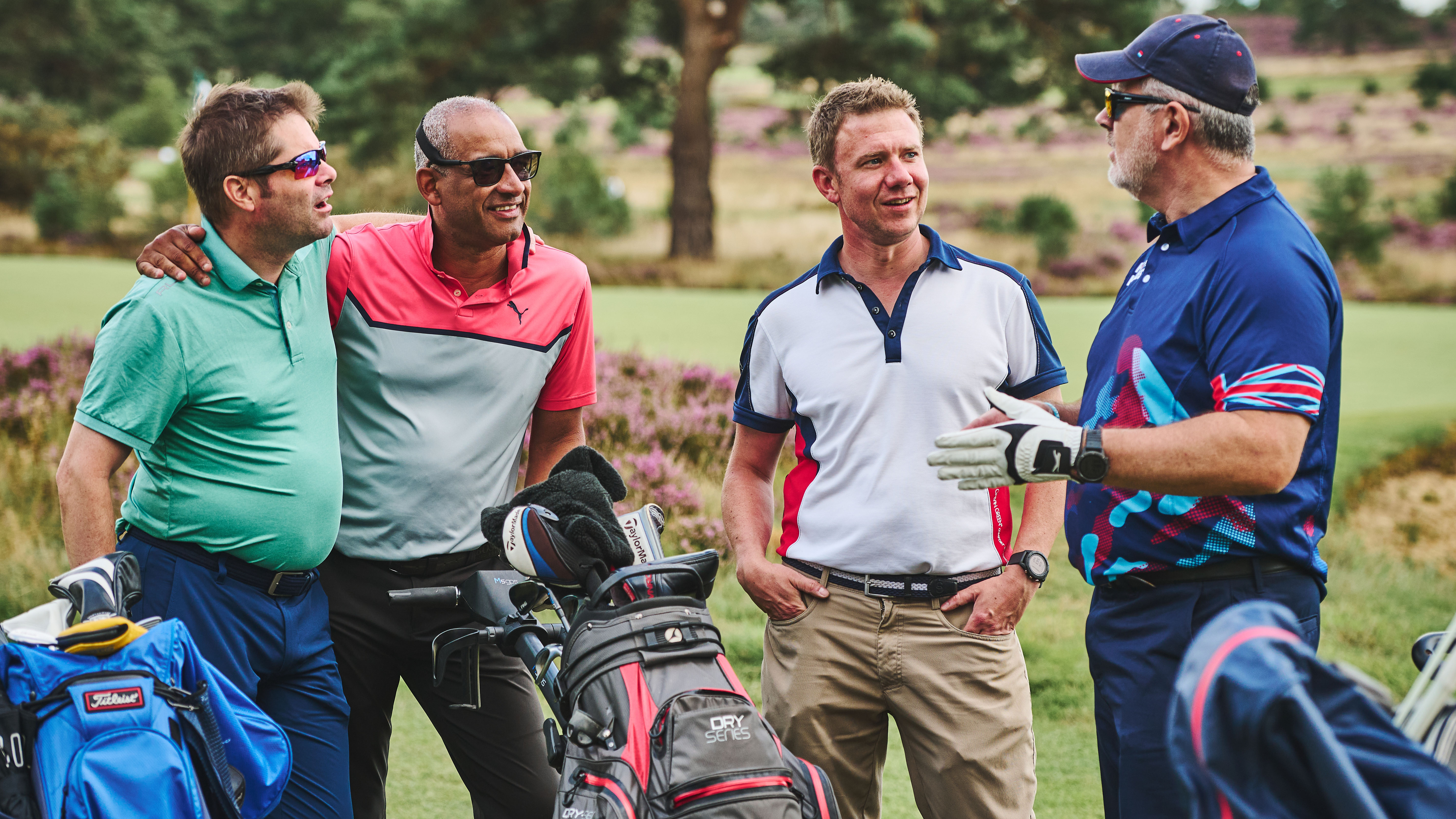 A group of golfers on the tee