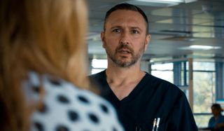 Alex Walkinshaw plays Adrian Fletcher in Holby City