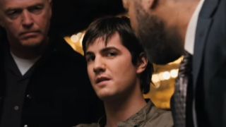 Jim Sturgess looking afraid while flanked by two men in 21.