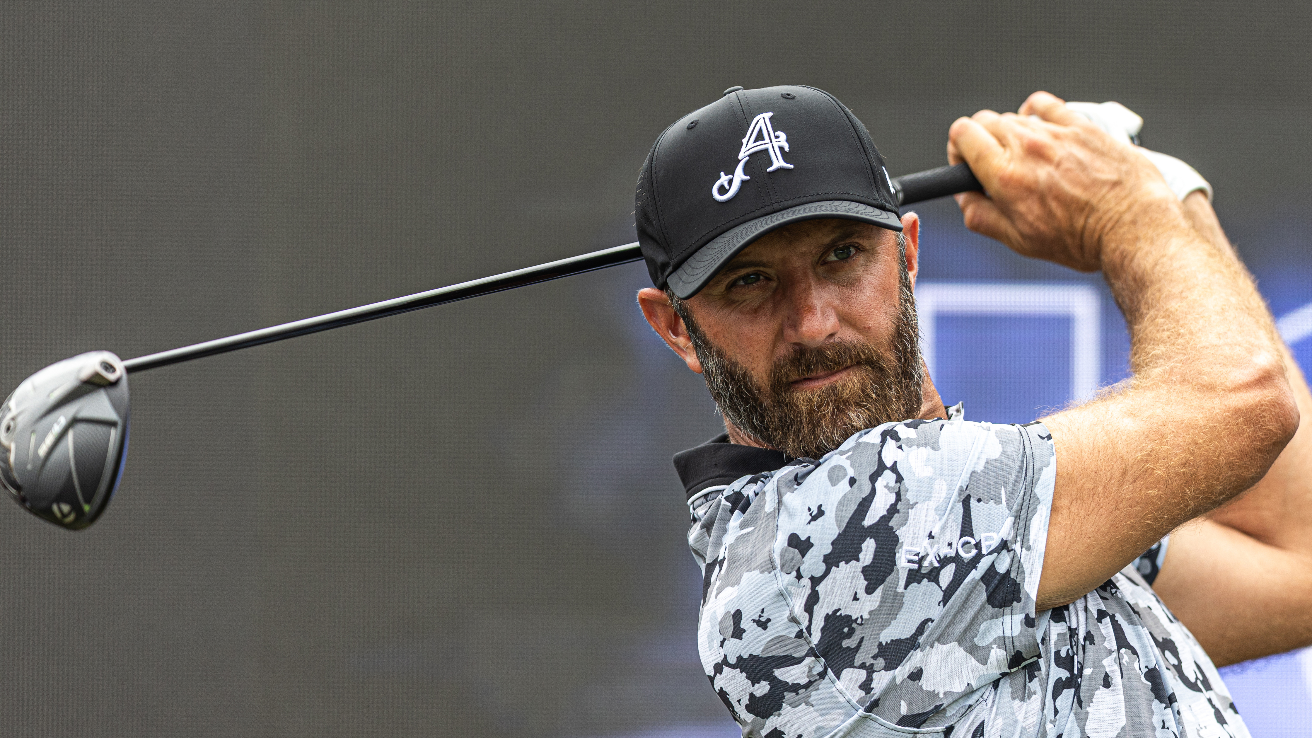 Photo of Dustin Johnson hitting driver