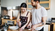 Man and woman preparing food