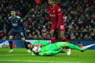 Liverpool goalkeeper Alisson Becker makes a save