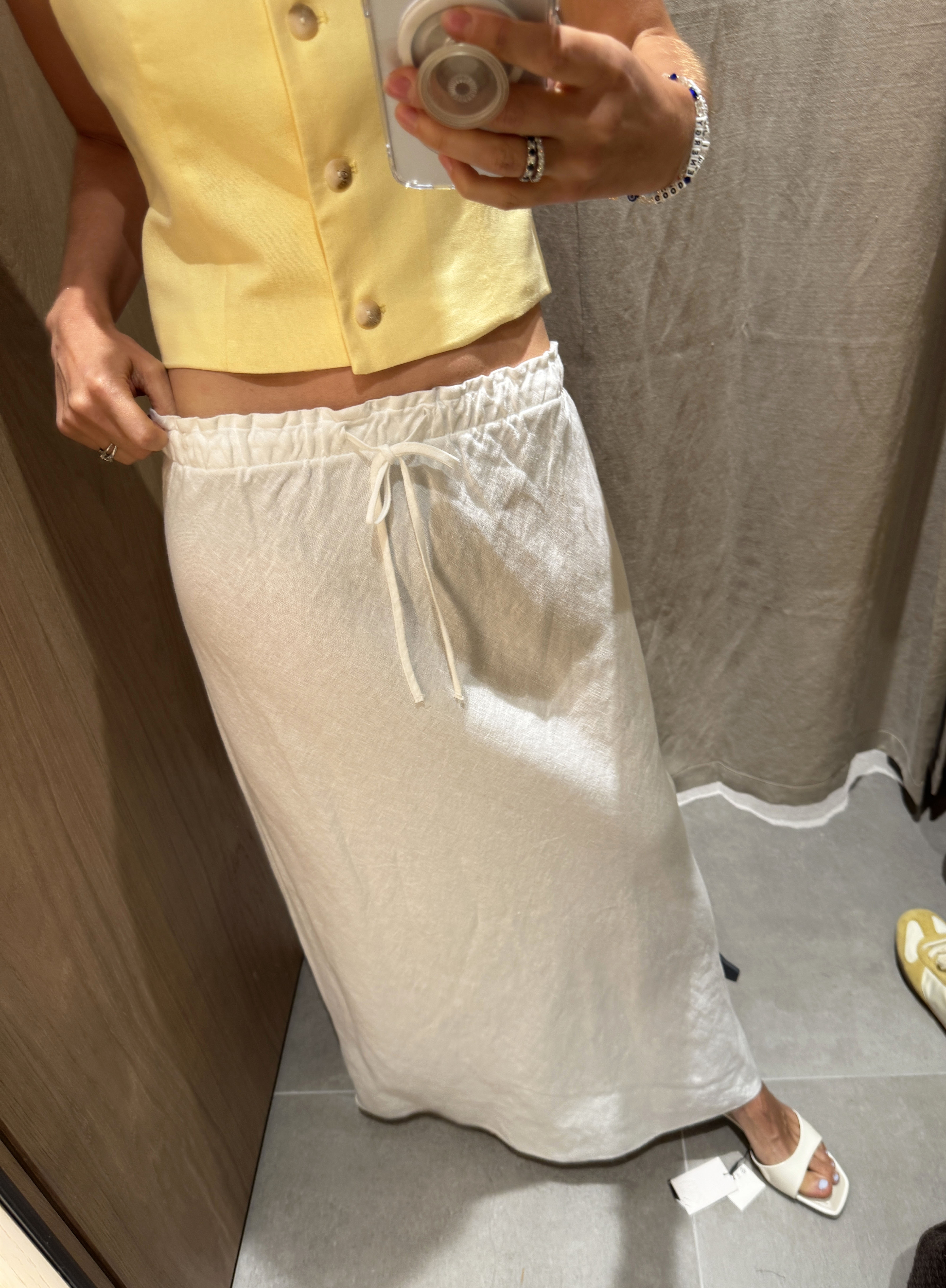 Woman wearing white linen dress