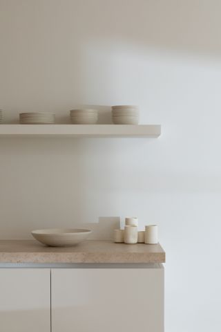 Limestone countertop in a neutral kitchen