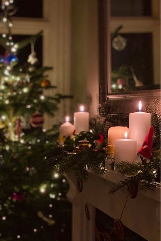 Christmas mantlepiece with pillar candles