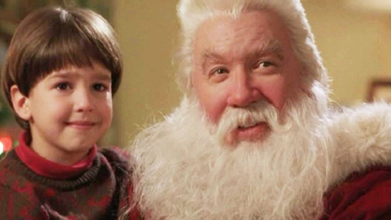 Tim Allen as Santa Claus with his on-screen son in The Santa Clause.
