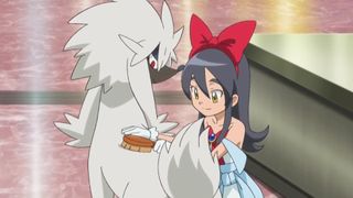 A Furfrou is groomed during a Pokemon anime episode