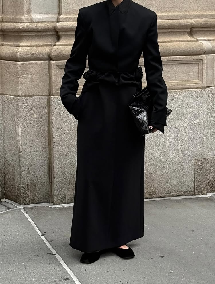 Image of Christie Tyler posing for picture, wearing a classic, minimal outfit by Fforme