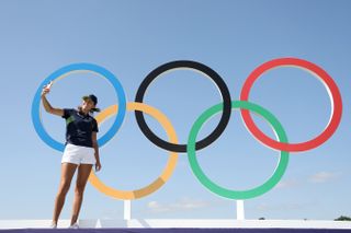 Pia Babnik takes a selfie in front of the Olympic Rings at Paris 2024