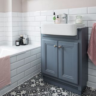 patterned floor blush walll bathroom