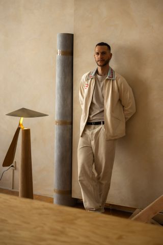 Federico Stefanovich, photographed by Maureen M Evans, in his Mexico City studio,with his ‘Folia’ floor lamp, and ‘Temis’ candleholder @federico.stefanovich