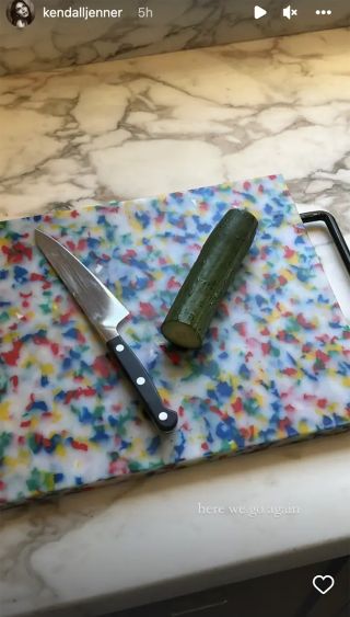 Kendall Jenner prepares to chop a cucumber on Instagram Stories.