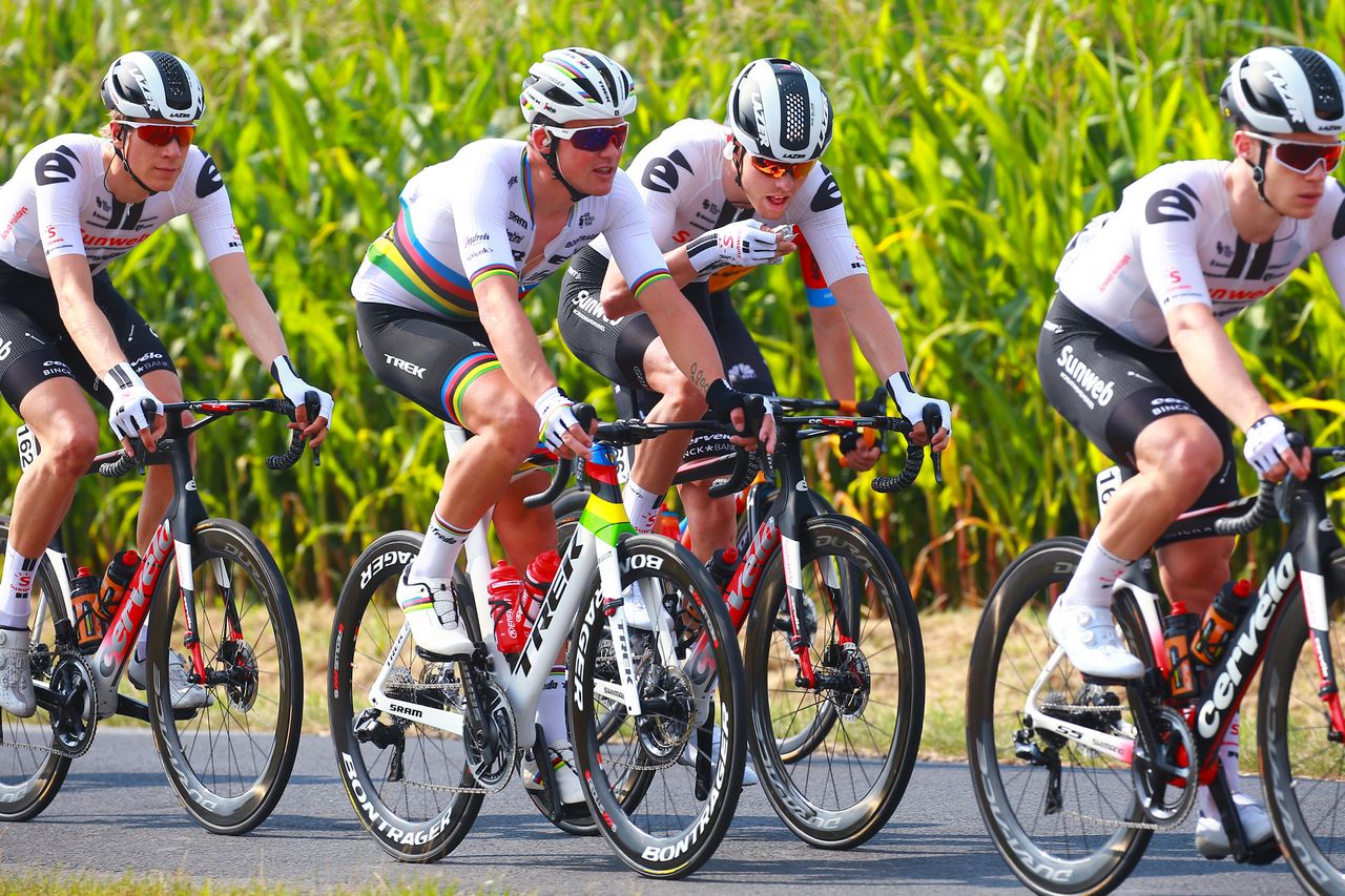 Mads Pedersen talks with a Trek-Segafredo teammate well before his sprint finish