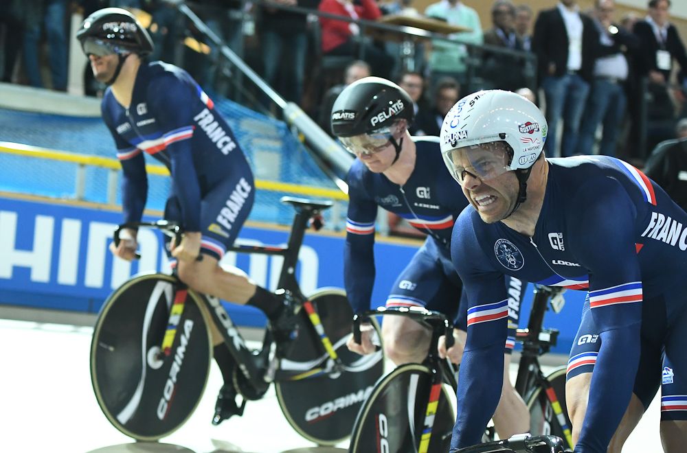 France's Quentin Lafargue, Sebastien Vigier and Francois Pervis take part in the men's Team Sprint qualifying round at The UCI World Cycling Championships in Apeldoorn