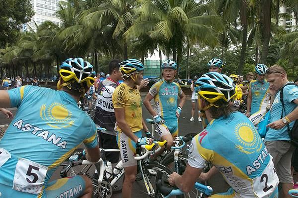 The team from Astana including tour leader Valentin Iglinskiy (yellow) and Alexandr Vinokourov (centre) relax after another day at the office.