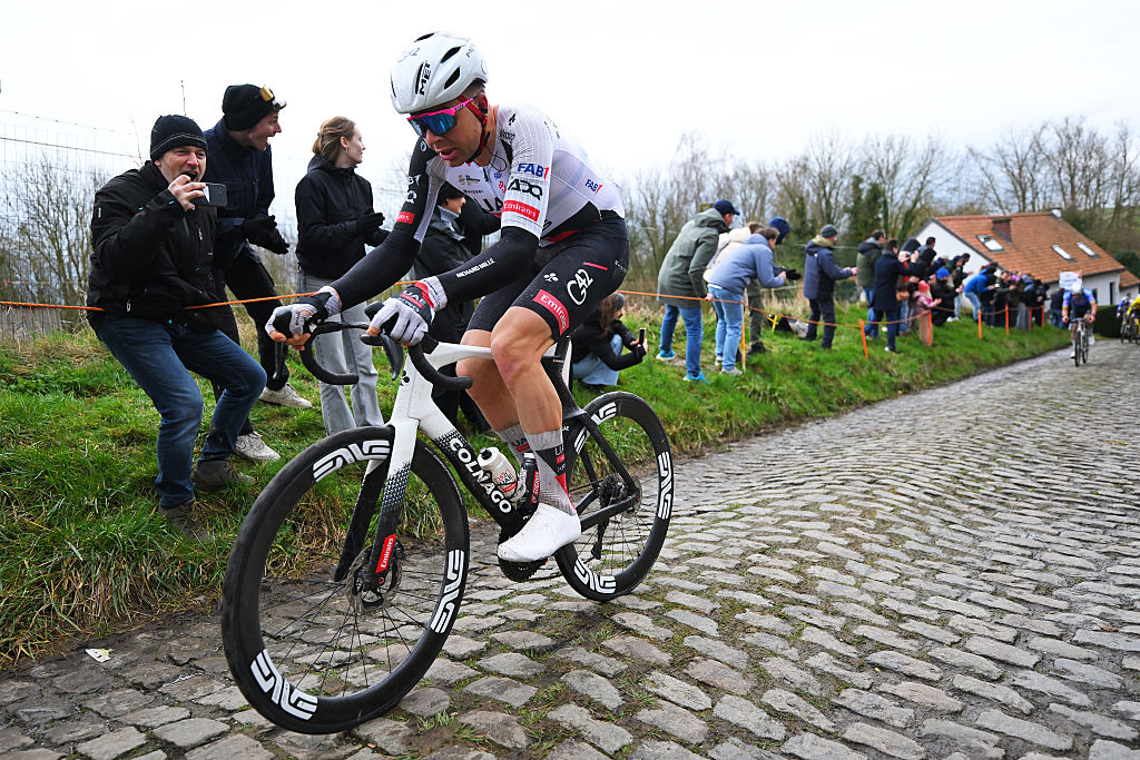 NIVONE, BELGIUM - FEBRUARY 28: Florian Vermeersch of Belgium and UAE Team Emirates - XRG competes in the breakaway passing through the Leberg cobblestones sector during the 21st Omloop Het Nieuwsblad 2026, Men&amp;amp;apos;s Elite a 207.2km one day race from Ghent to Ninove / #UCIWT / on February 28, 2026 in Ninove, Belgium. (Photo by Tim de Waele/Getty Images)