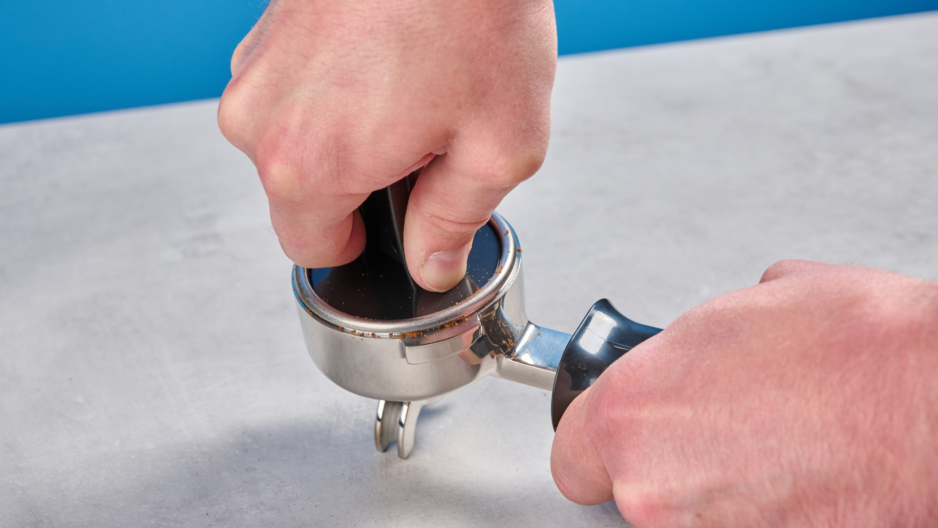 The Gaggia Classic E24 Evo Pro portafilter being tamped
