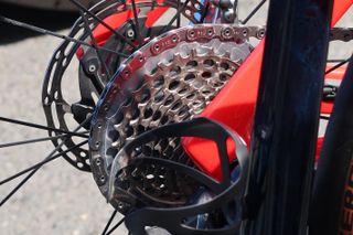 A bike cassette with the chain on the biggest cog
