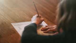Girl doing math homework.