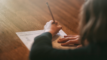 Girl doing math homework.