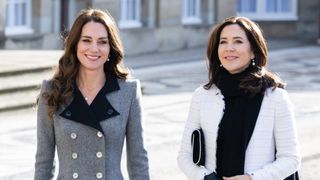 Princess of Wales and Queen Mary walk across the Amalienborg courtyard on February 23, 2022