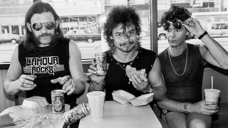 Portrait of the British metal band Motorhead at a McDonald's restaurant in Chicago, Illinois, August 5, 1983. Left to right, Ian 'Lemmy' Kilmister (1945 - 2015), Phil Taylor, and Brian Robertson