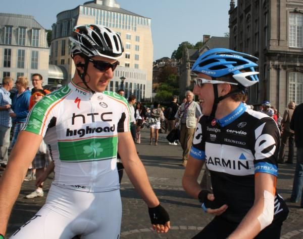 Irish national champion Matt Brammeier checks that compatriot Dan Martin is okay