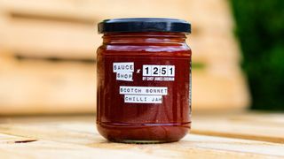 Sauce Shop x 1251 chilli jam on wooden table