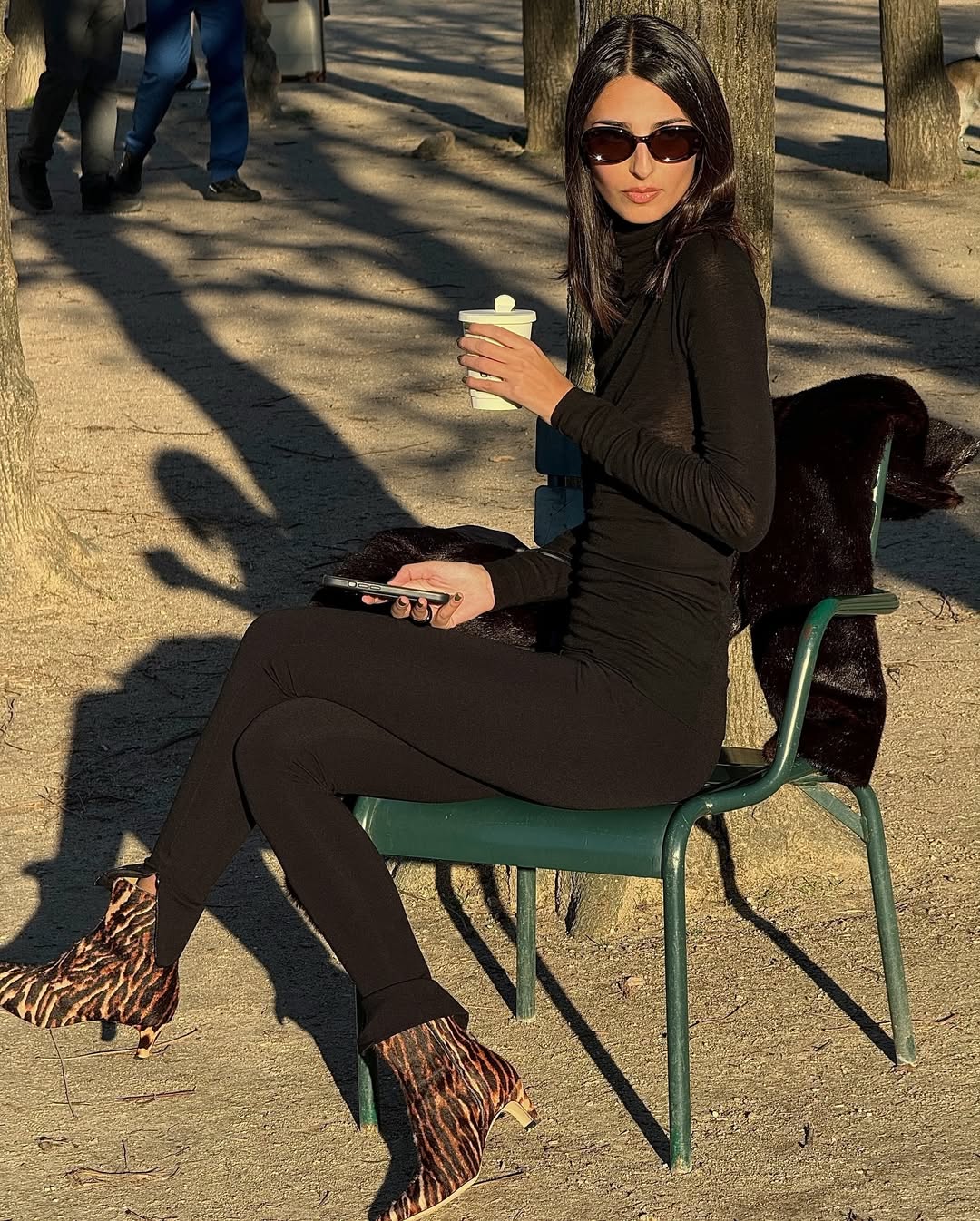 woman wearing flattering black pants with slight flare