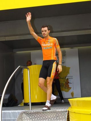 Euskaltel-Euskadi's Samuel Sanchez waves to the crowd.