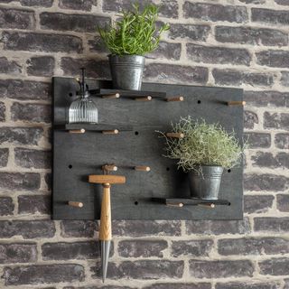 Pegboard used as garden storage