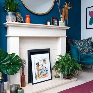 living room with blue wall and fireplace