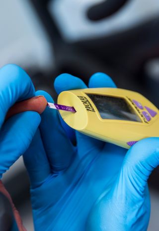 Image of blood sample being taken for lactate test