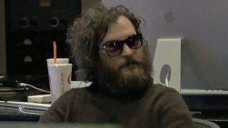 Joaquin Phoenix in the recording studio in the mockumentary I'm Still Here.
