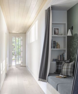hallway with bespoke shelves and built in seat