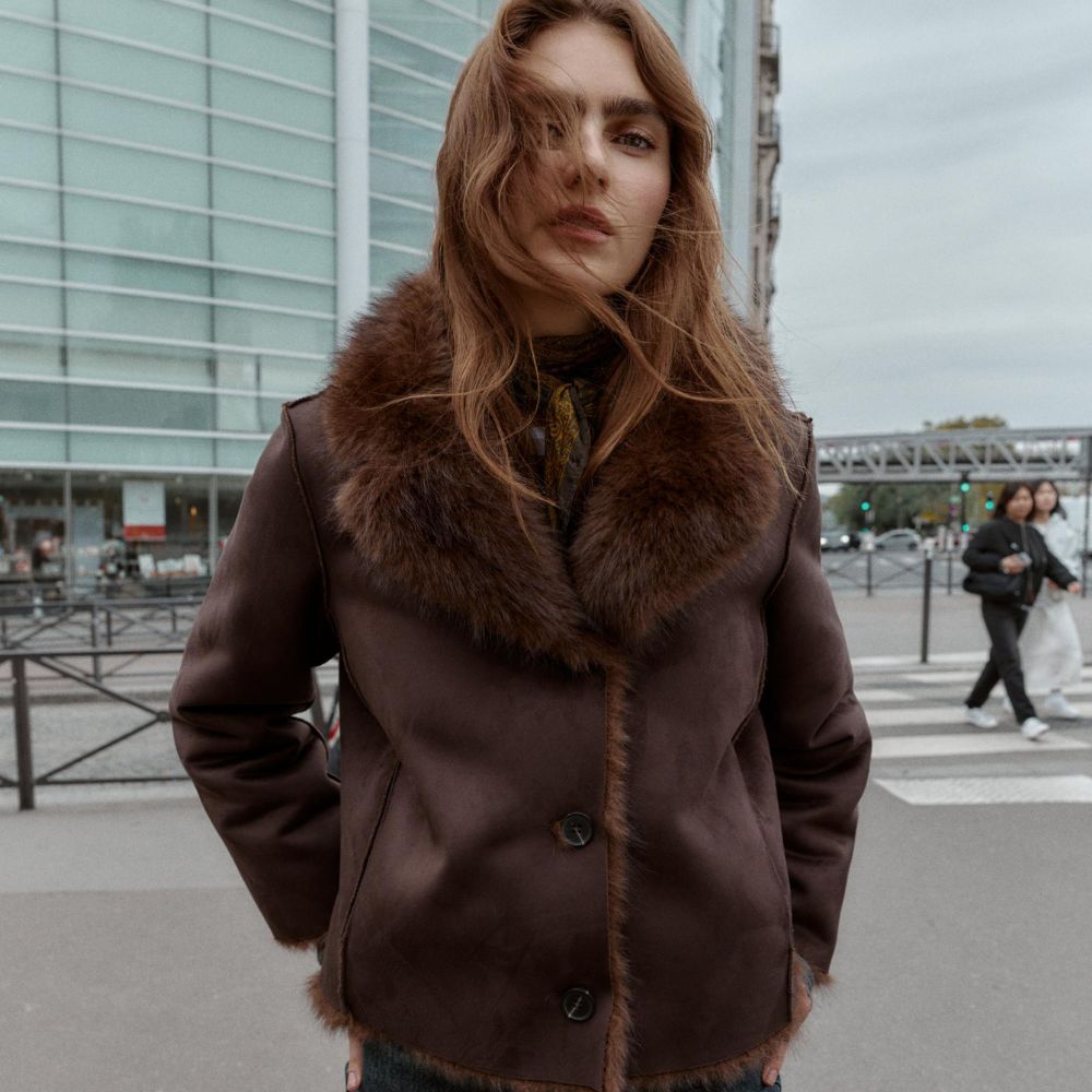 Woman wears reversible jacket