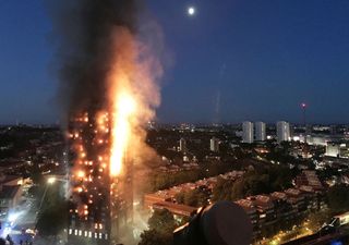 A huge fire engulfs the 24-story Grenfell Tower in London in the early hours of the morning on June 14, 2017.