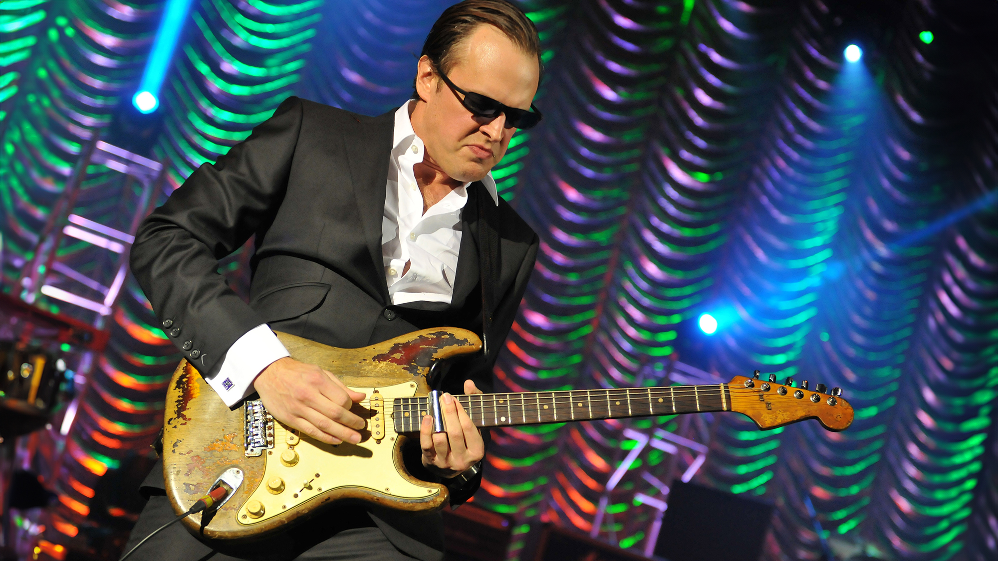 Joe Bonamassa performs on stage at HMV Hammersmith on October 21, 2011 in London, United Kingdom. He's playing Rory Gallagher's 1961 Fender Stratocaster.