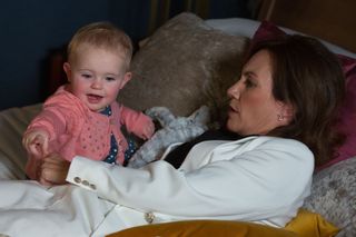 EastEnders Rainie hides in her hotel room with Abi