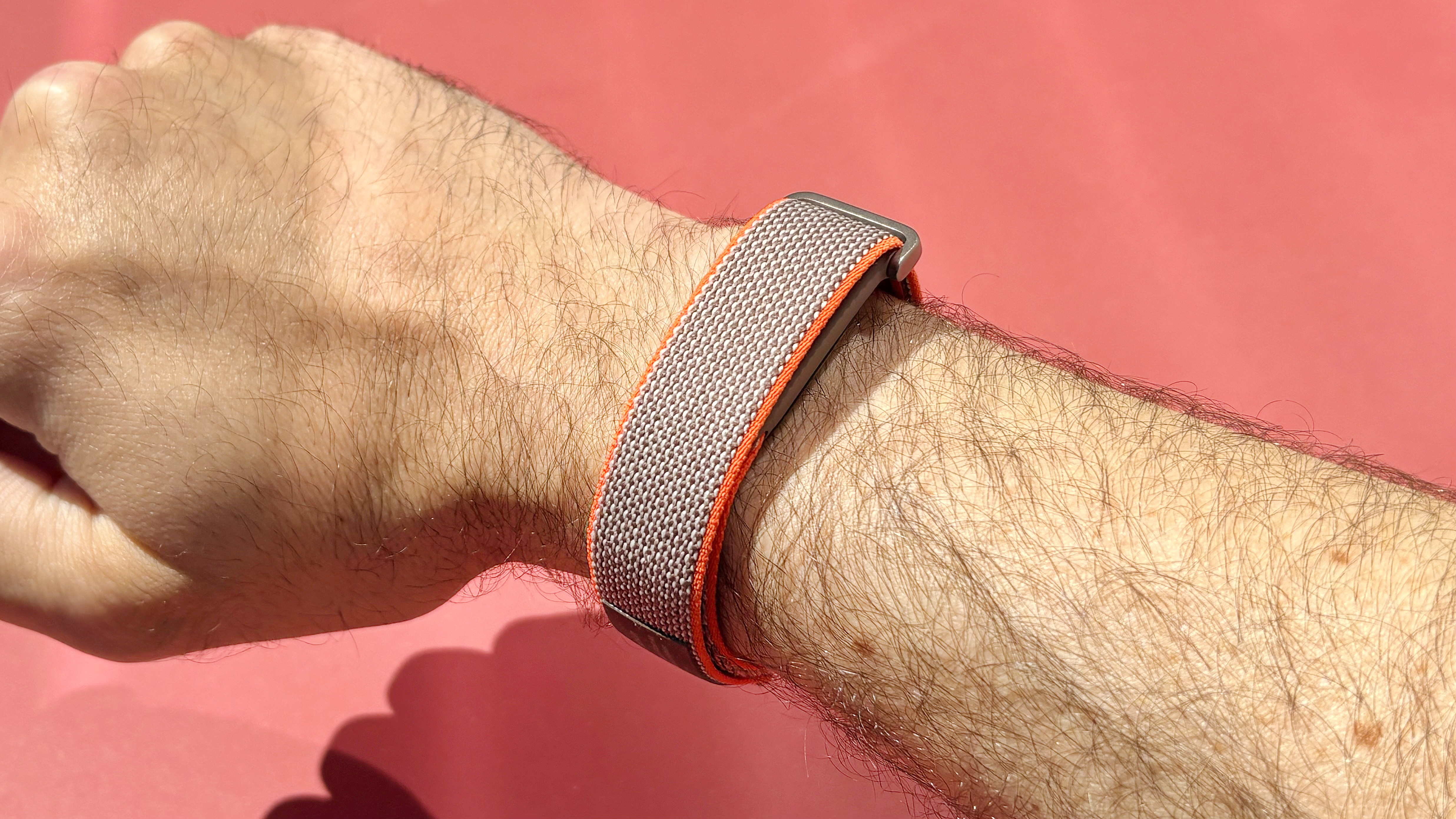 Hands-on with the Fitbit Air on the orange and brown Stephen Curry strap